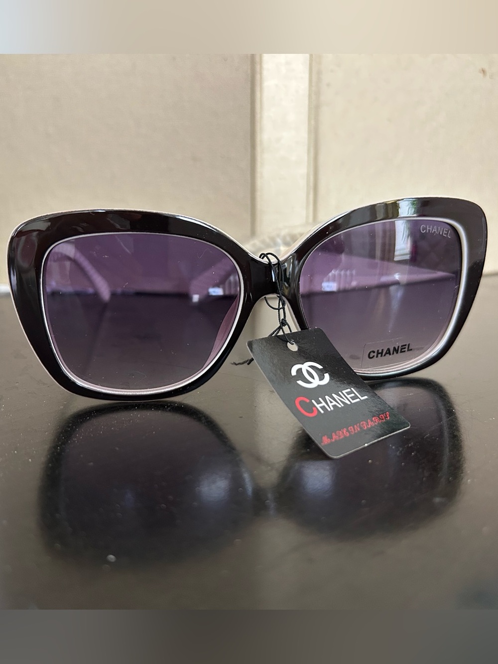 White-Black Cat-Eye Sunglasses with Purple Lenses